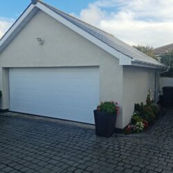 White up and over garage door fitted to a property in Newport